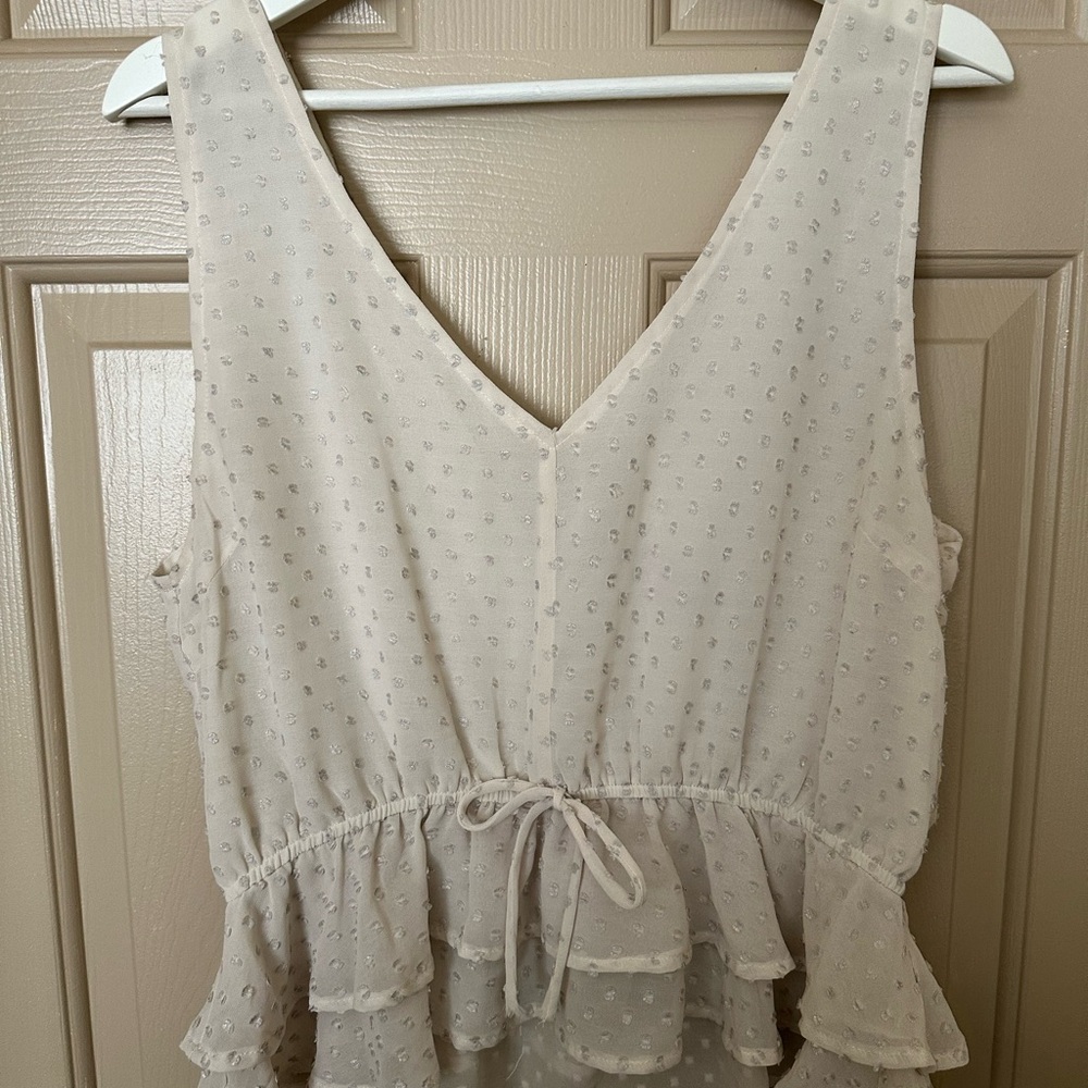 Alya Cream Textured Sleeveless Blouse